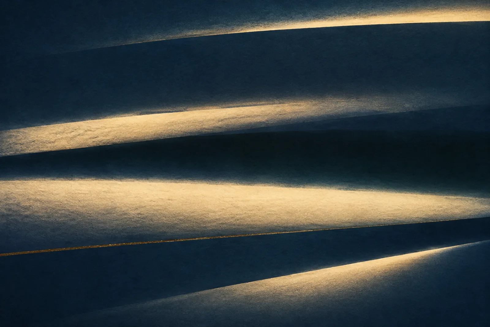 A dark navy surface crossed by four soft bands of warm cream light at shallow angles, each band raking across the texture from a different direction.
